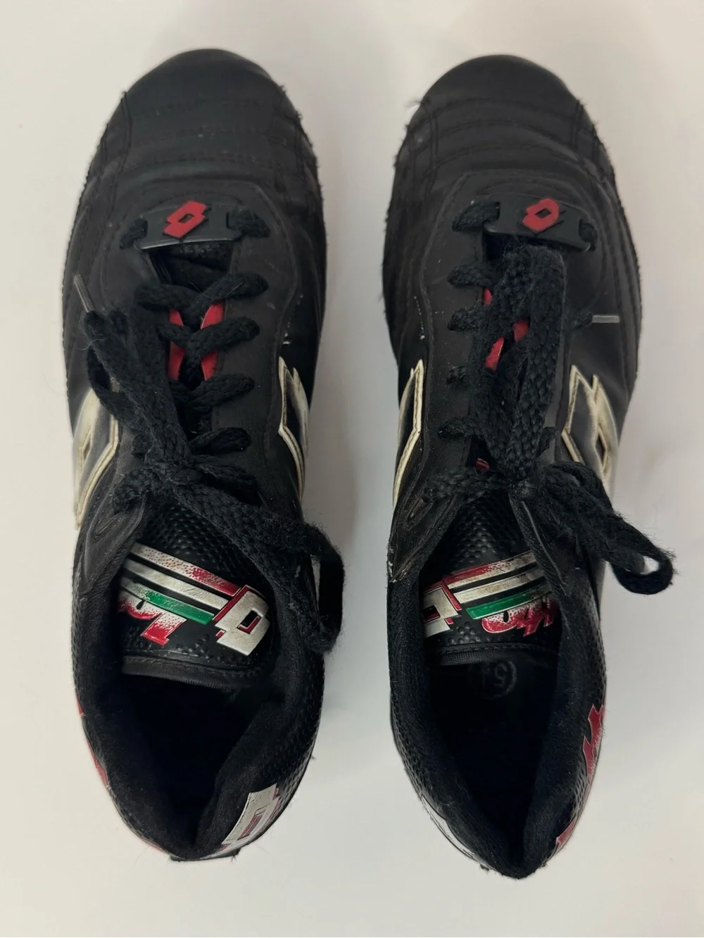 Kids Black Soccer Cleats with Red Details